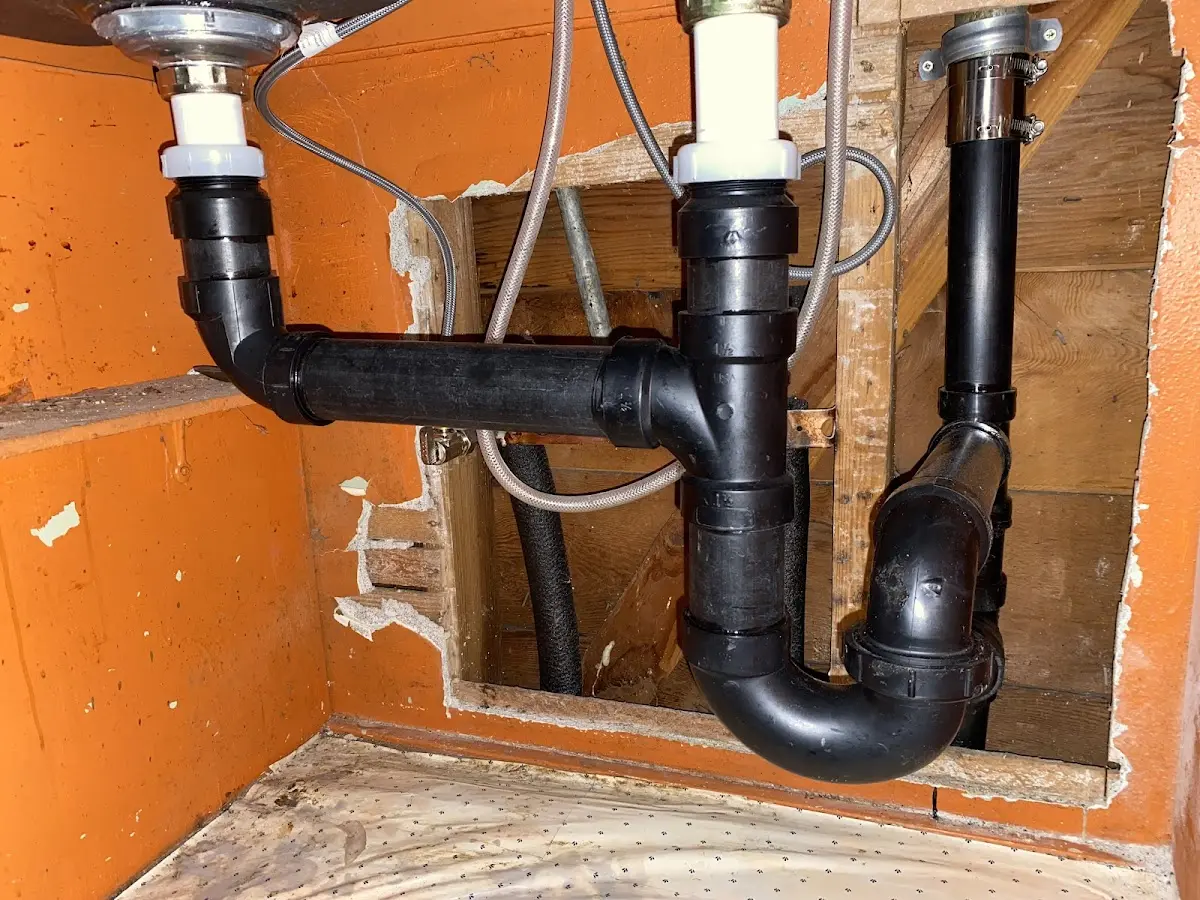 Professional Garbage Disposal Repair equipment and tools on the job in Marcellus